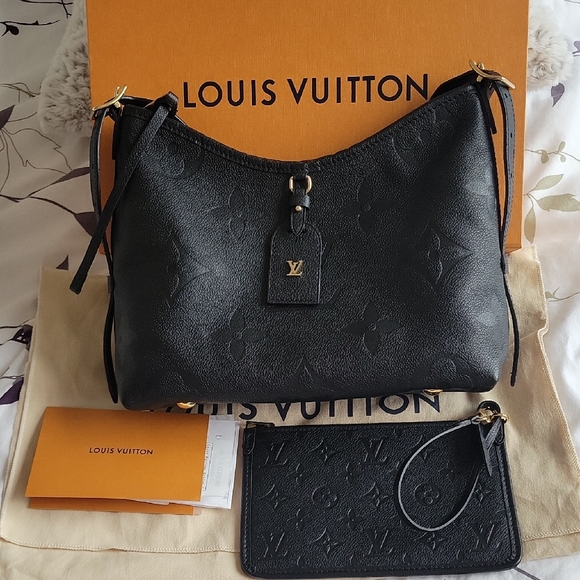 Louis Vuitton Handbags - Louis Vuitton Carryall PM Black Empreinte Leather